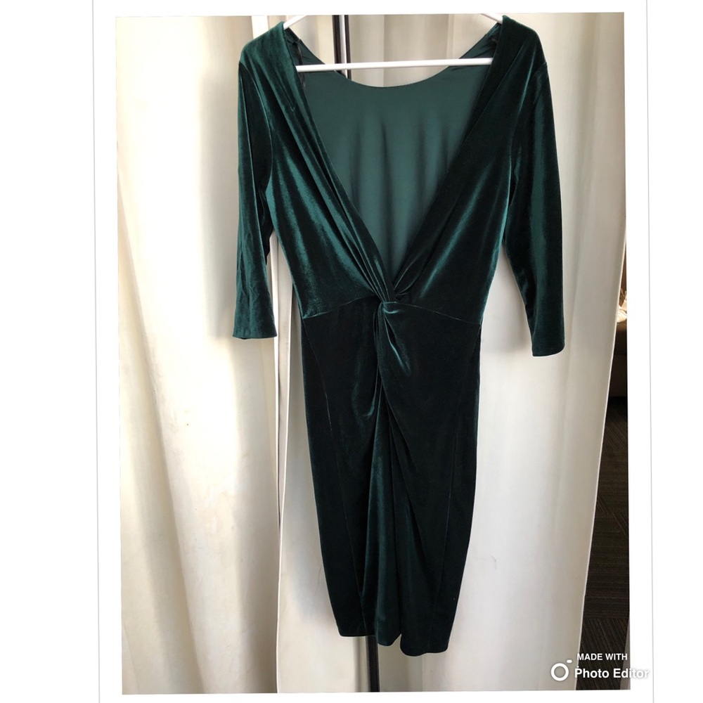 Green velvet open back midi dress.